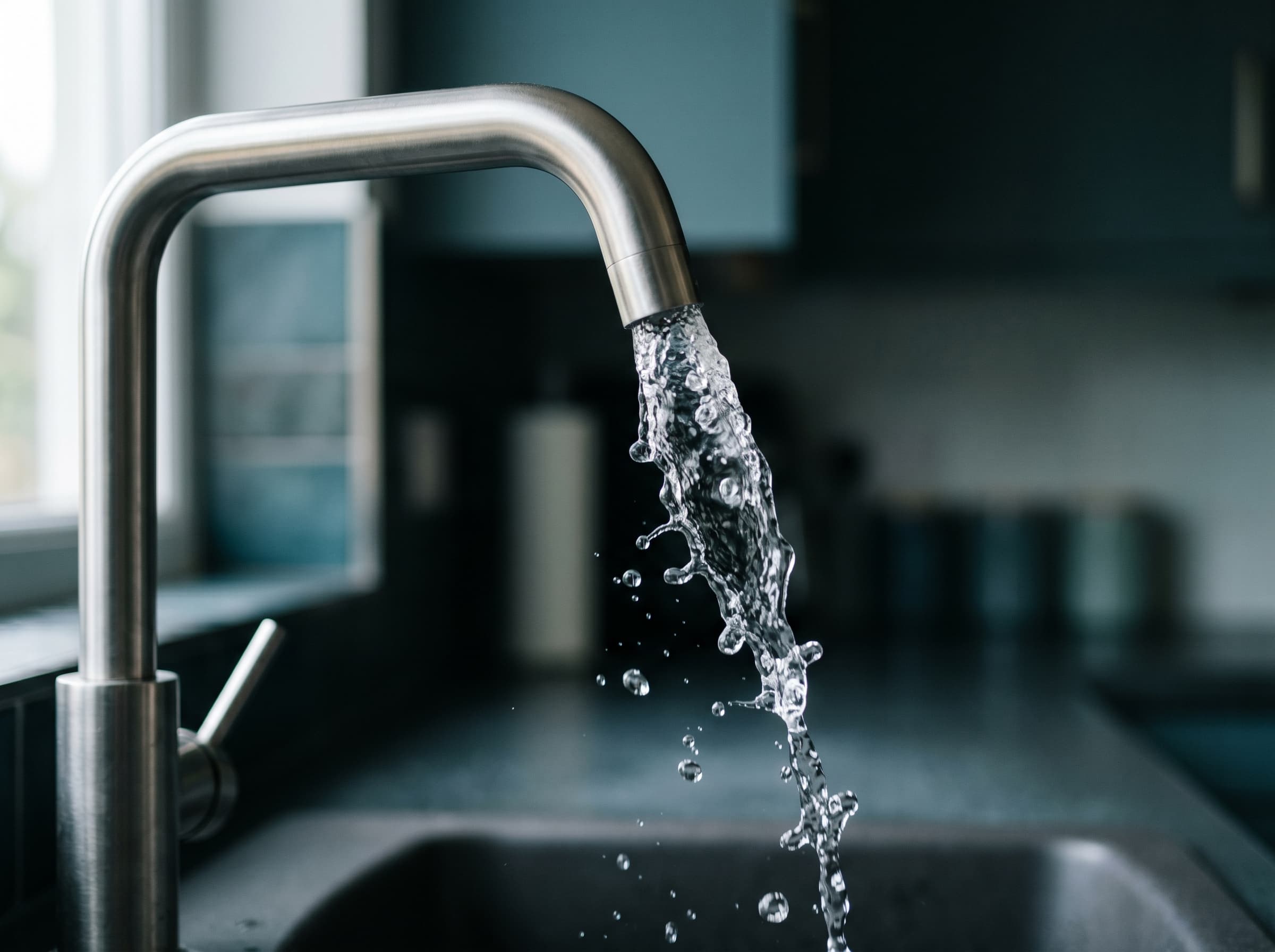 Water flowing from a kitchen tap
